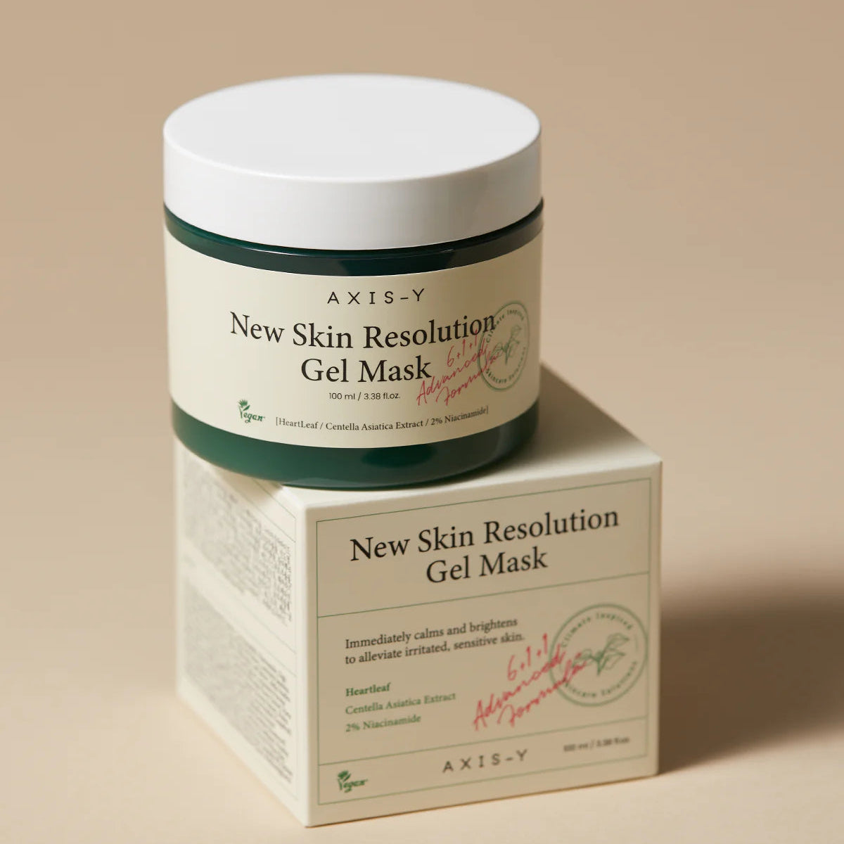Axis-Y New Skin Resolution Gel Mask jar and box on a beige background