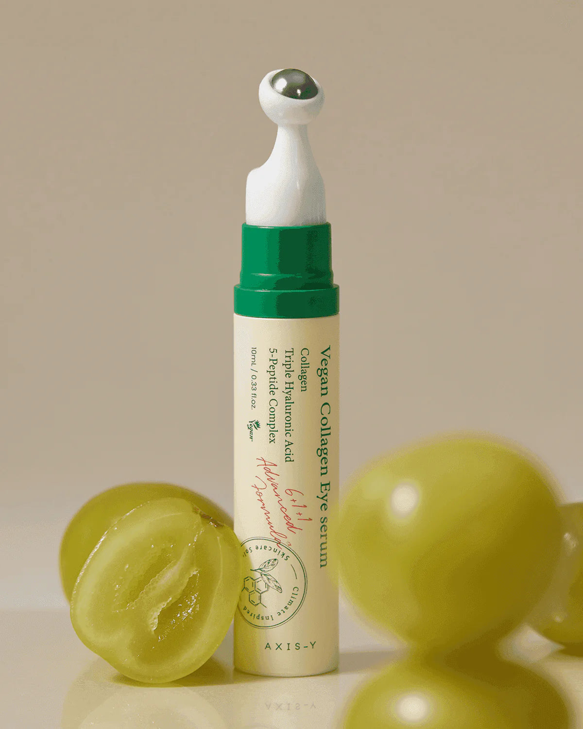 Vegan Collagen Eye Serum with grapes on a beige background